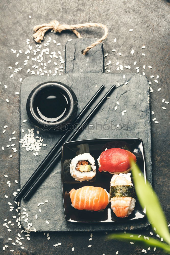 Similar – Crop woman eating sushi