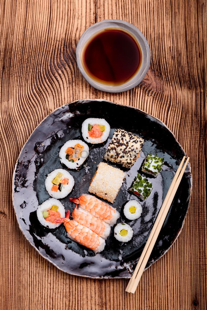 Image, Stock Photo Sushi set on pottery plate with chopsticks and soy sauce