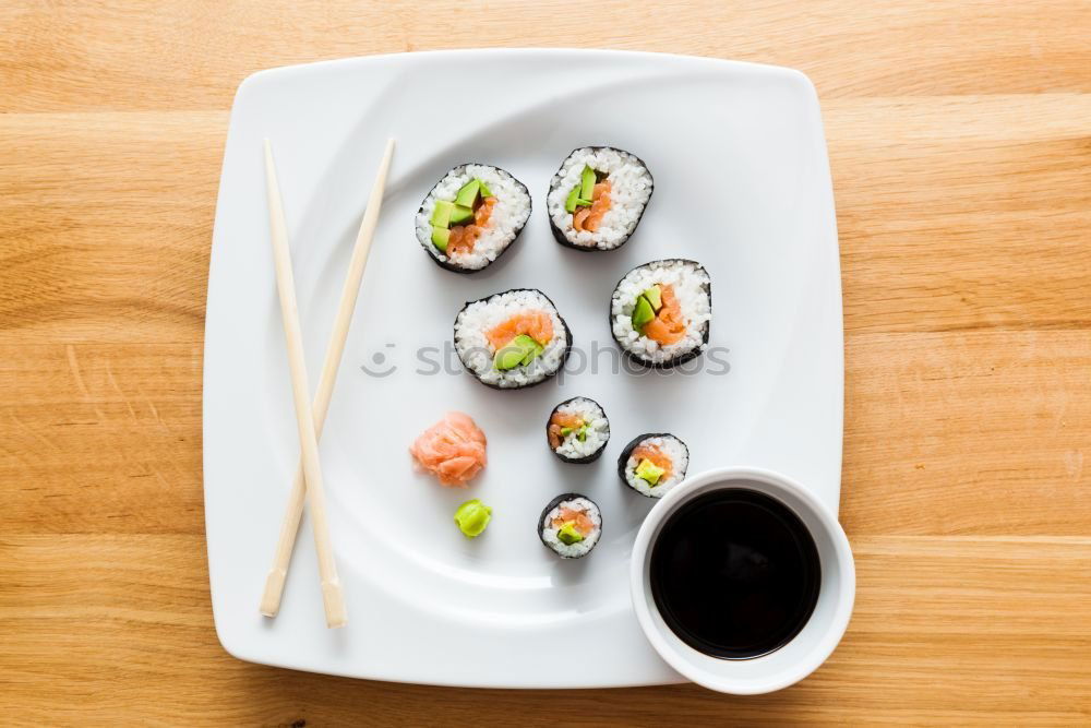 Similar – Crop woman eating sushi