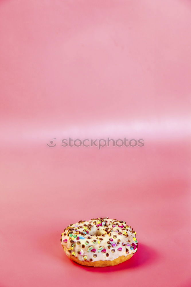 Similar – Half donut with colorful decoration