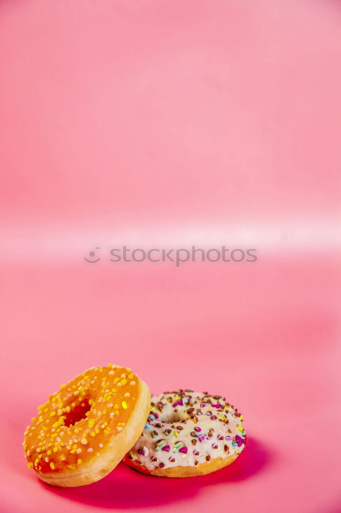 Similar – Half donut with colorful decoration