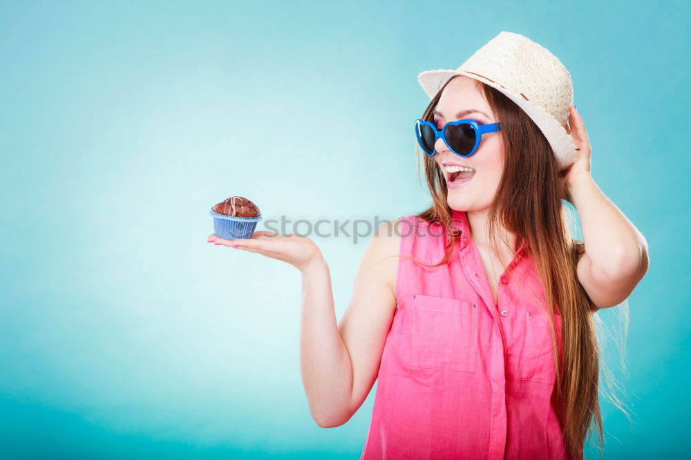 Similar – happy boy drinking orange juice on blue background