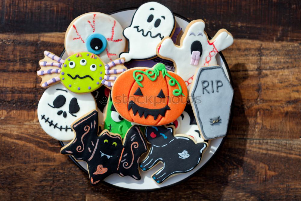 Similar – Image, Stock Photo Happy Halloween Dessert