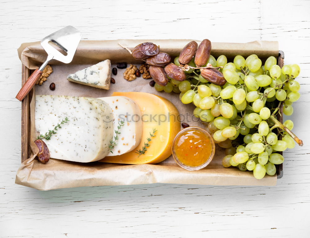 Similar – Image, Stock Photo cheese and grapes board