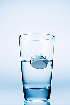 Similar – Glass filled to the brim with water in monochrome blue.