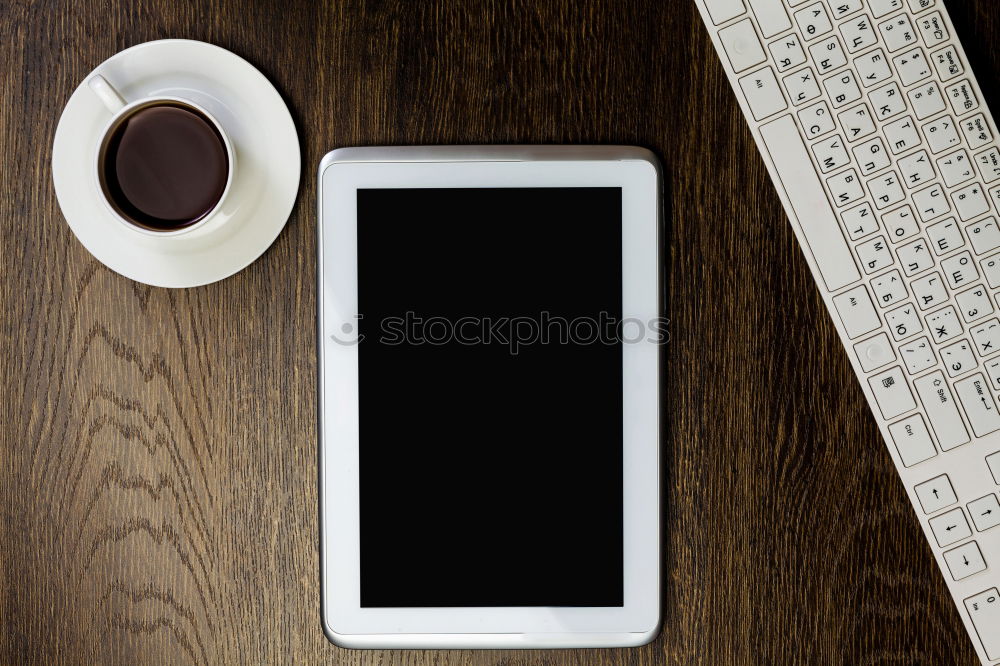 Similar – Image, Stock Photo keyboard and phone with black screen on wooden desk.