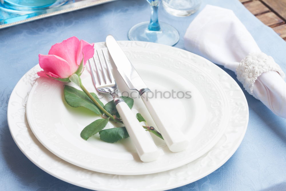 Similar – White dish on a pink wooden surface