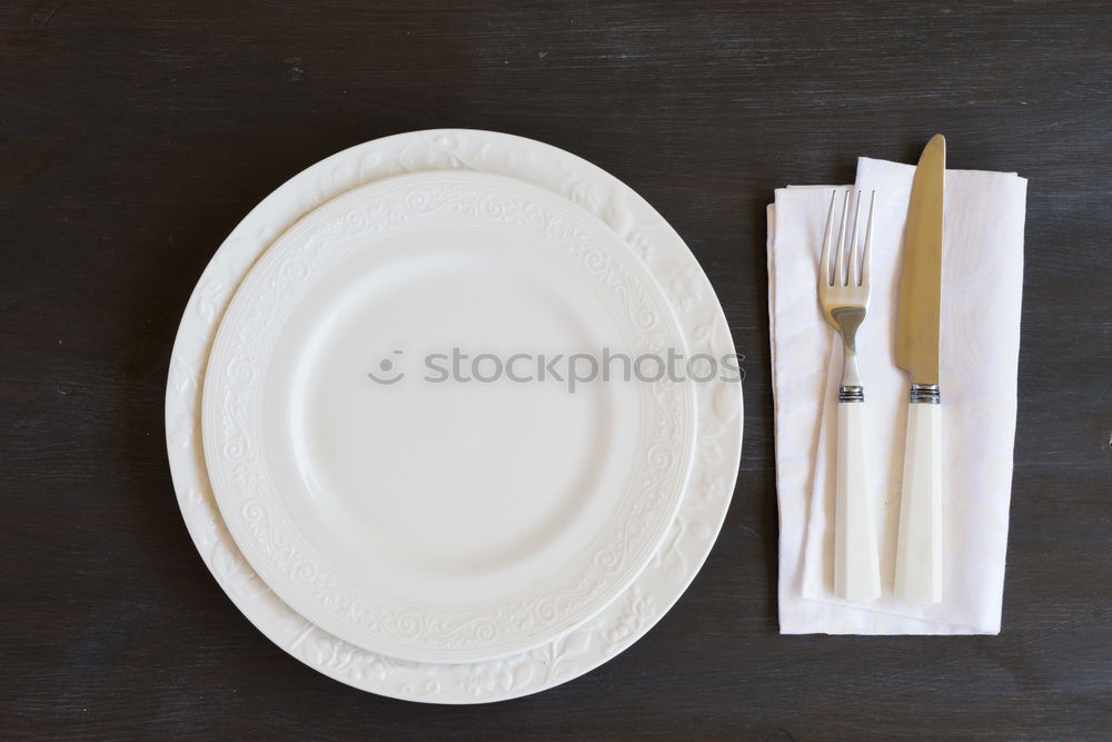 Similar – White round plate Dinner