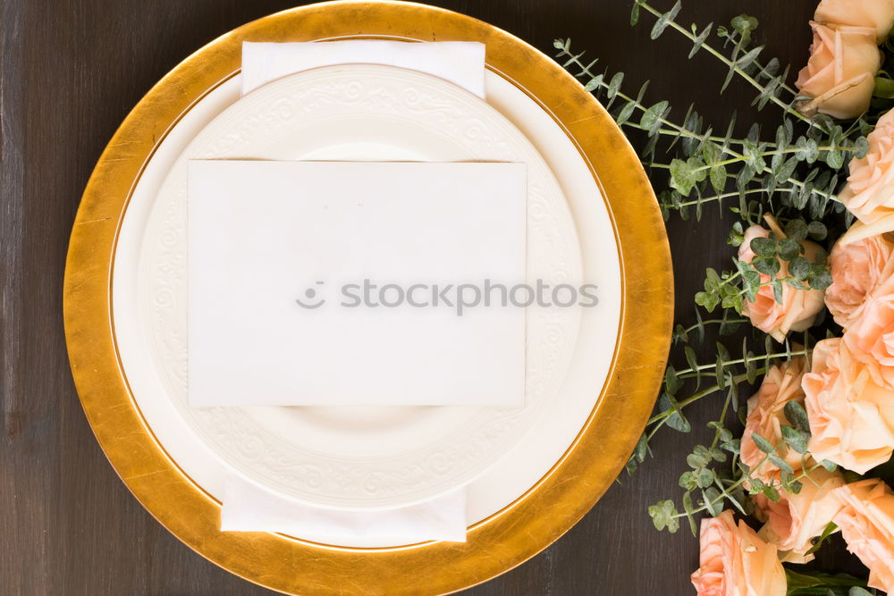 Similar – White plate with vintage iron cutlery