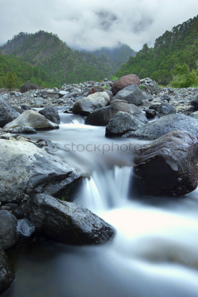 Similar – Mountain river valley landscape