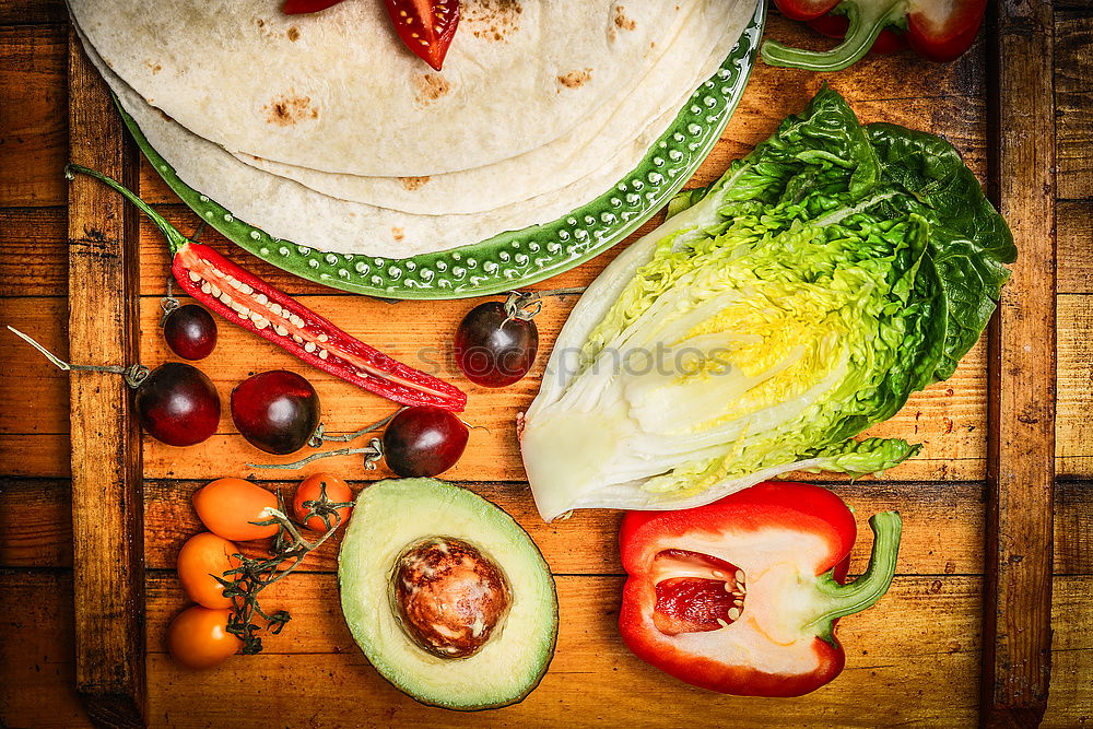 Similar – Image, Stock Photo Tortillas and Vegetables Ingredients for Burritos or Tacos