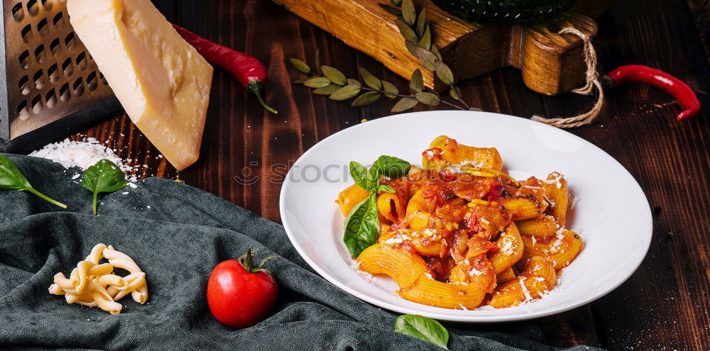 Similar – Image, Stock Photo Spaghetti Carbonara in old pot with parmesan and herbs.