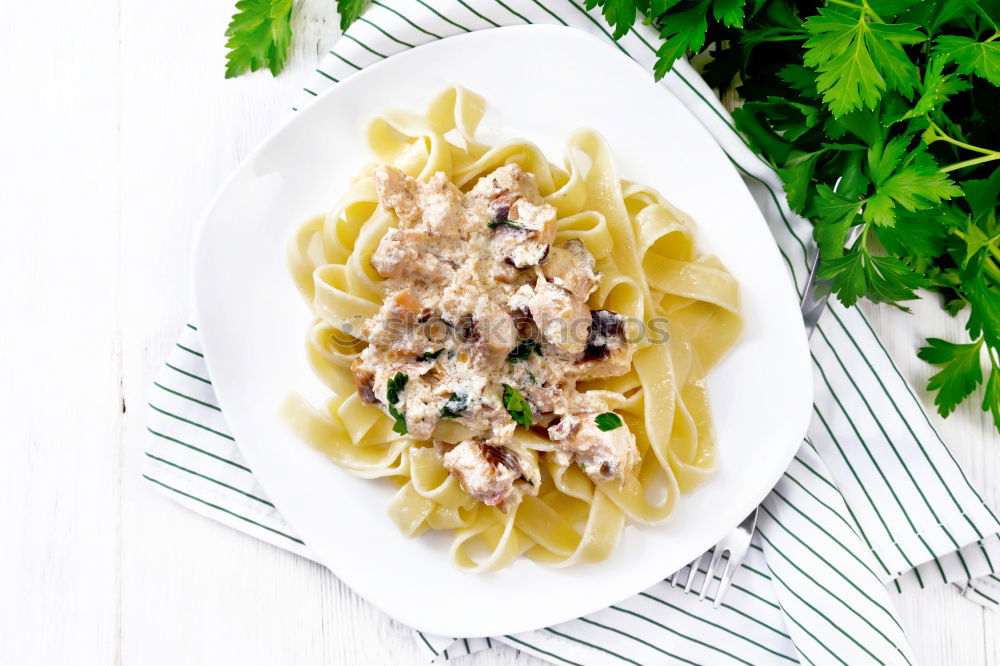 Similar – Spaghetti Carbonara in a green plate