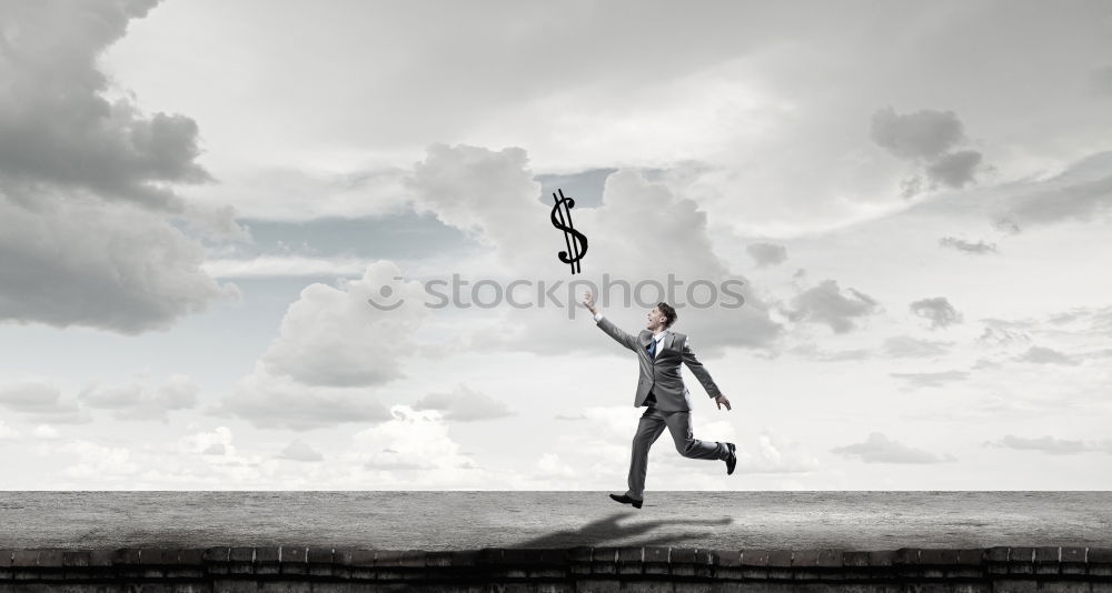 Similar – Anonymous man enjoying storm on pier