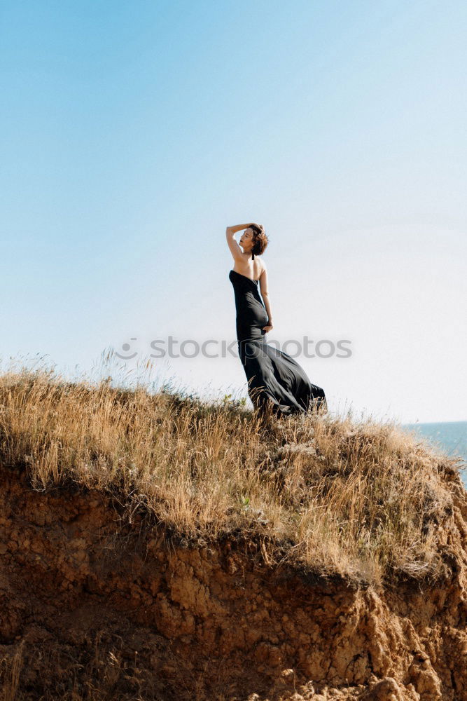 Similar – Girl Lying Down on a Bench at San Francisco, California