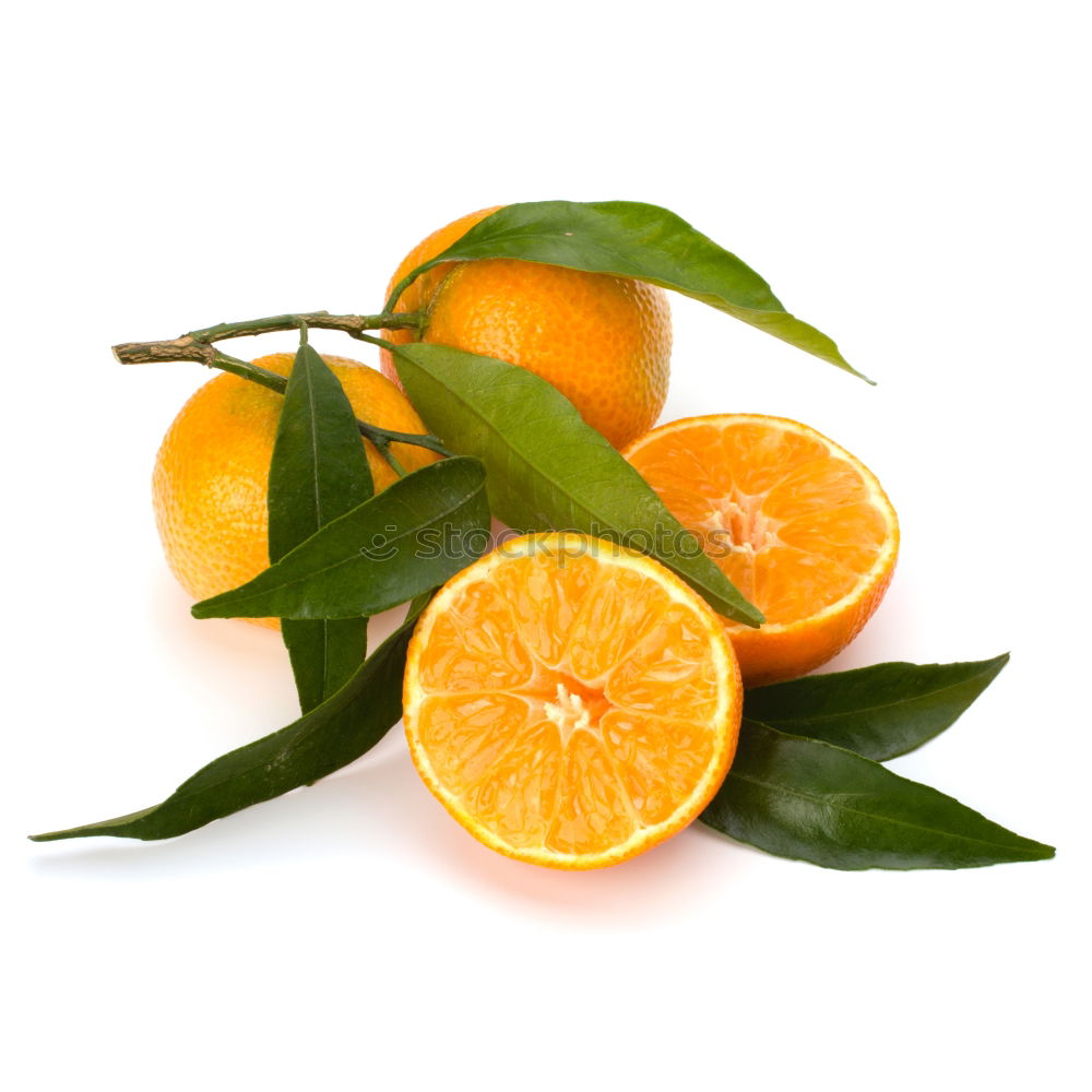 Similar – Orange fruit with green leaves on white wood