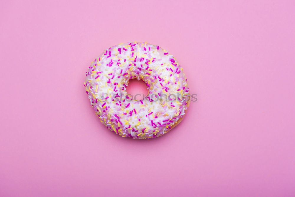 Similar – Sugar sweet donut on pink background