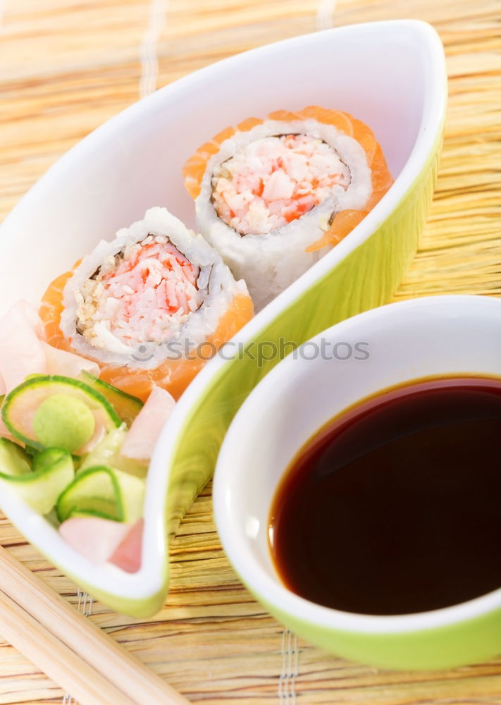 Similar – Image, Stock Photo Sushi set on pottery plate with chopsticks and soy sauce