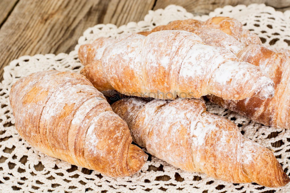 Similar – fresh bread and baked goods on wooden