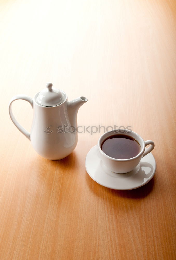 Similar – Two hands holding full cups of coffee and green tea