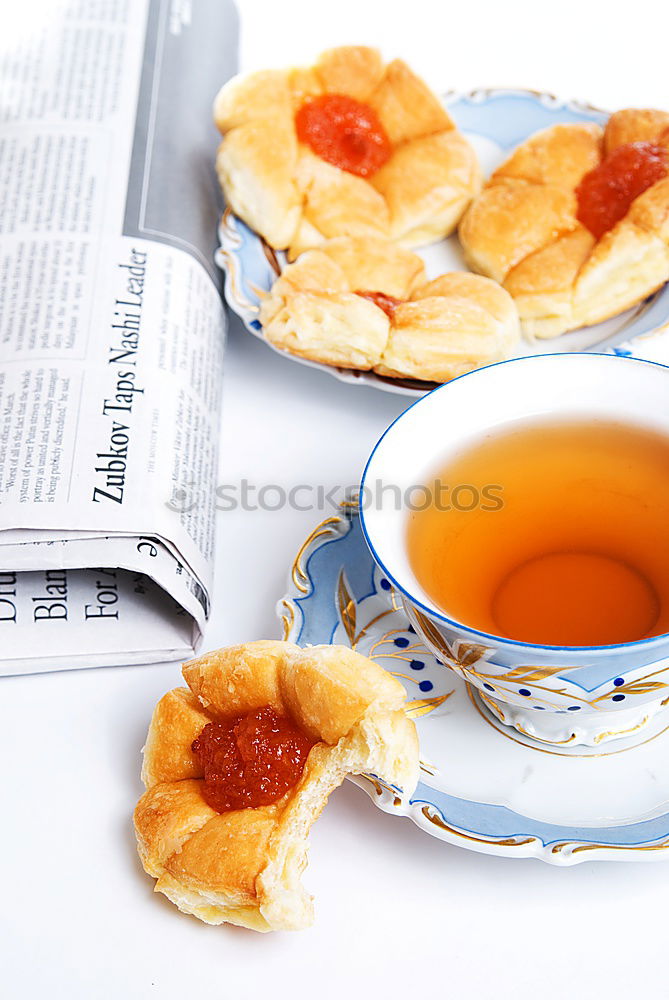 Similar – tea break with cups, flowers, cake and teapot