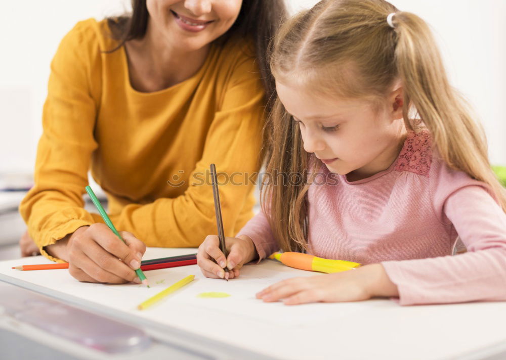 Similar – Image, Stock Photo Mom with little daughter drawing the colorful pictures