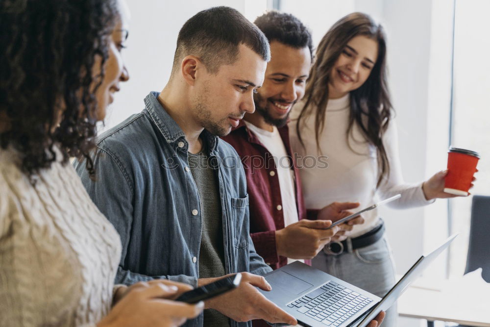 Similar – Group of young adults having a meeting in the office