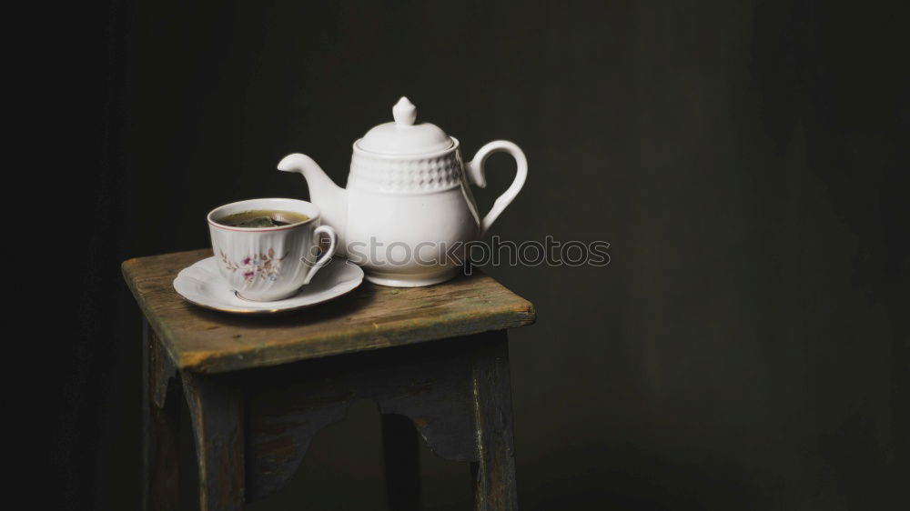 Similar – Tea set on dark background