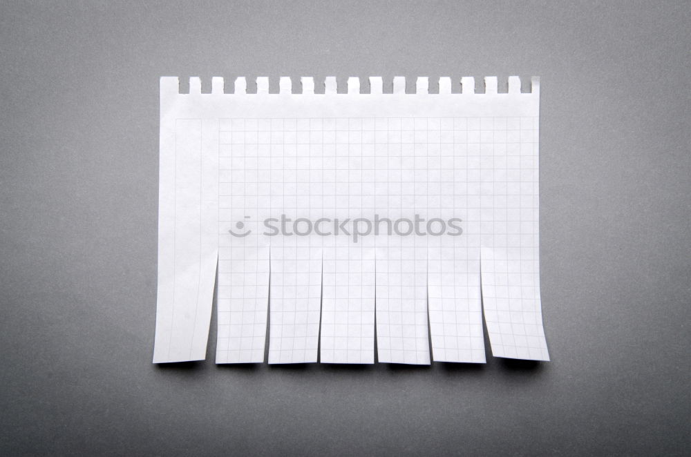 Similar – Lined notebook with spiral, pencil and a crumpled piece of paper on an old wooden table