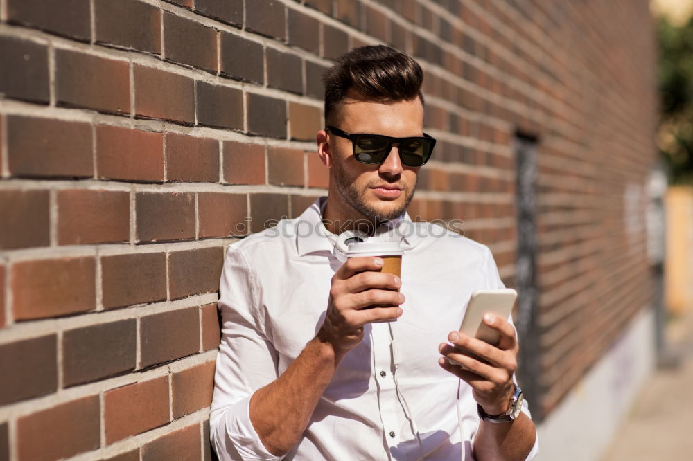 Similar – portrait of a happy man use his phone in the market