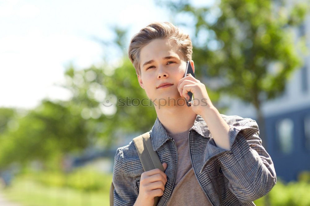 Similar – Image, Stock Photo Young man wearing denim clothes using a mobile phone