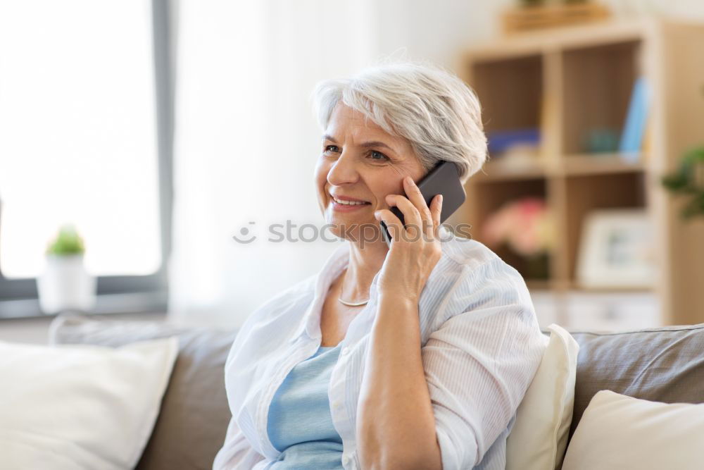 Similar – Image, Stock Photo Elderly woman on the mobile phone at home