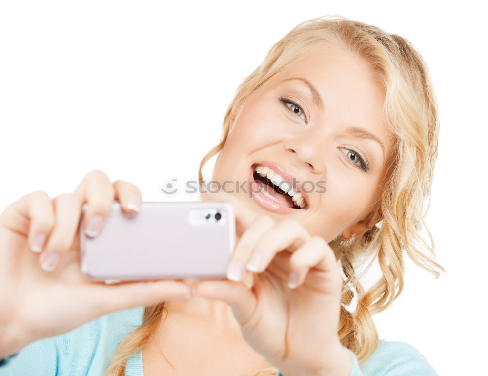 Similar – Young blonde girl with her mobile phone