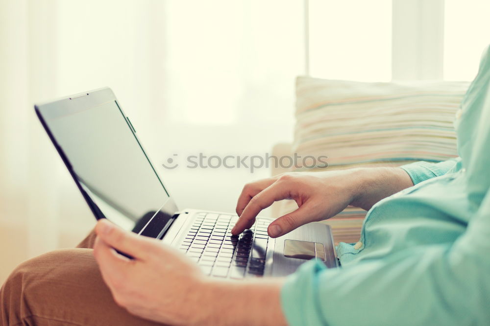 Similar – Two businessman meeting and using smartphone with laptop at outdoor cafe