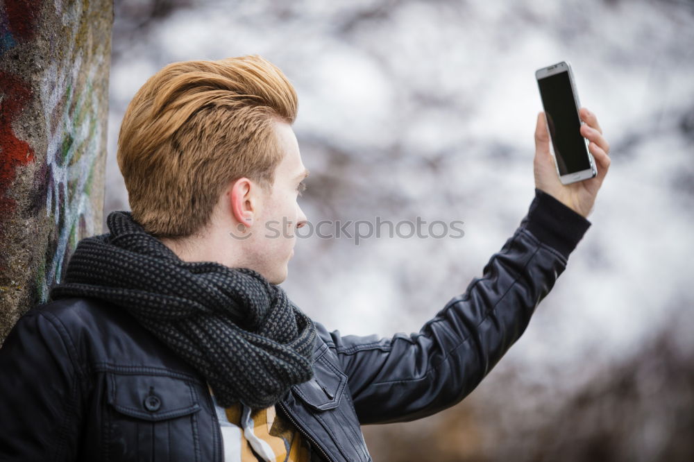 Similar – Image, Stock Photo Young woman is holding smartphone in her hands at the beach