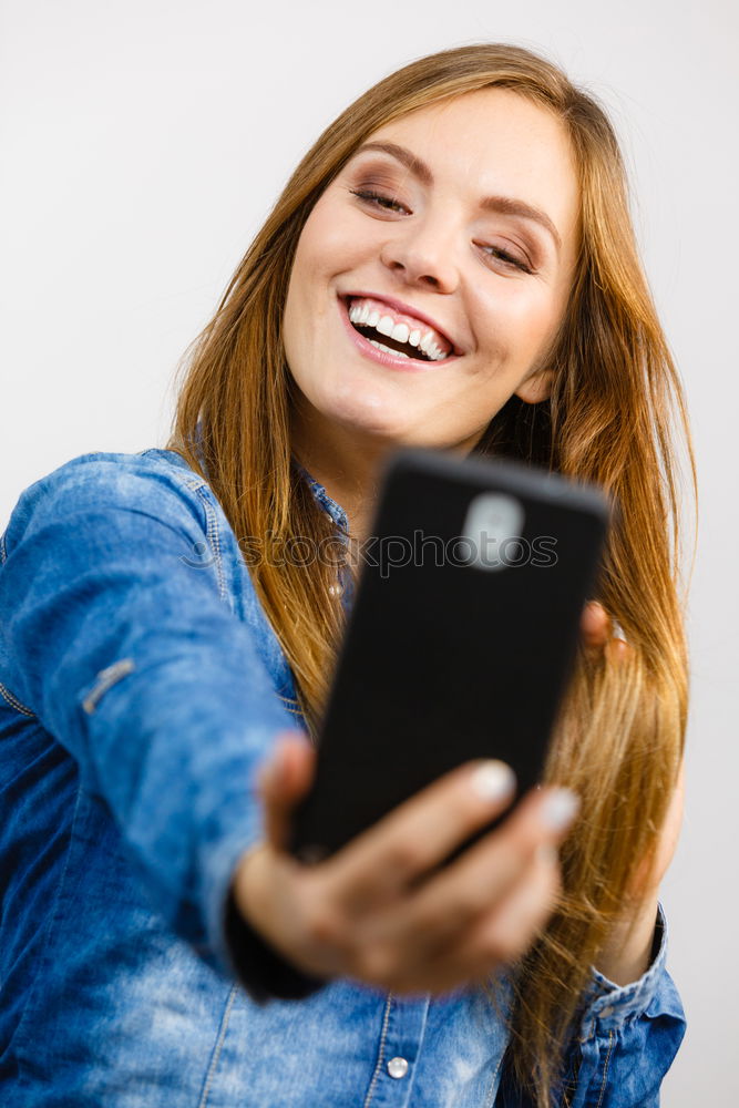 Similar – Image, Stock Photo young woman sitting at home sofa using mobile phone