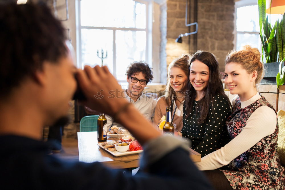 Similar – Attractive young woman paying in a shop