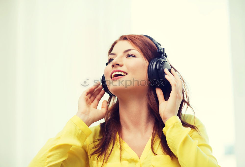 Similar – Image, Stock Photo Pretty blonde woman listening to music on couch at home