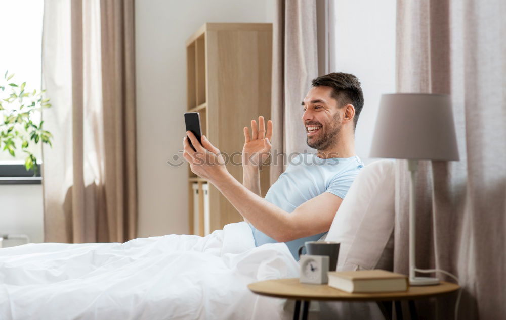 Similar – Image, Stock Photo Young couple reading book on couch at home