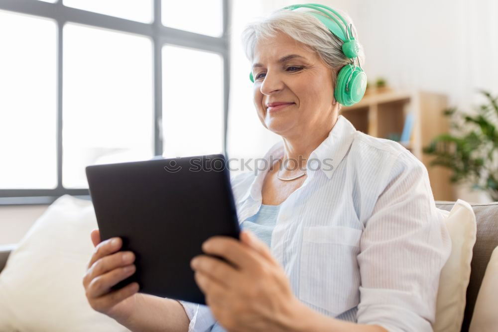 Similar – Image, Stock Photo Caregiver checking blood pressure to a senior woman