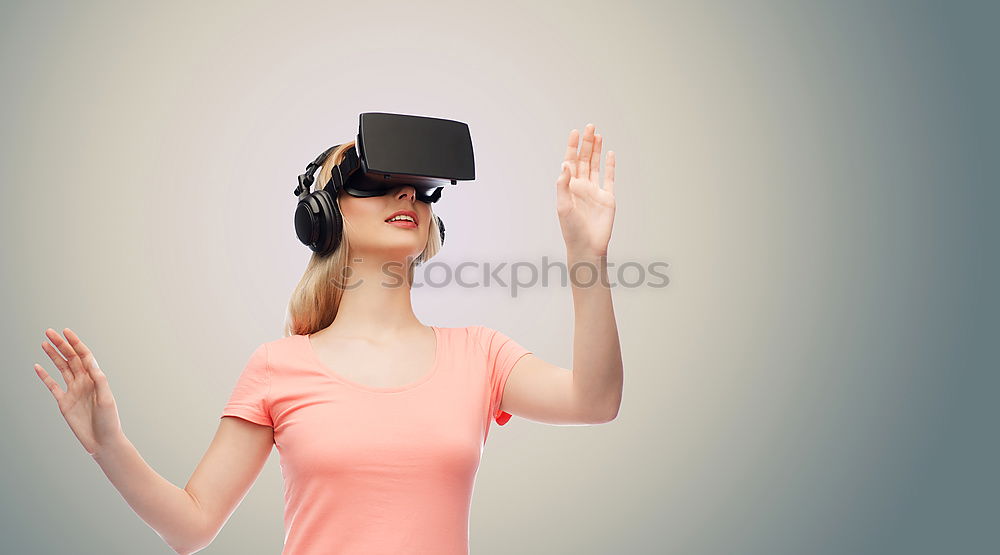 Similar – Image, Stock Photo Woman experiencing virtual reality in home