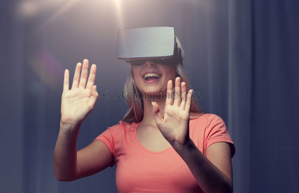 Similar – Image, Stock Photo Woman experiencing virtual reality in home