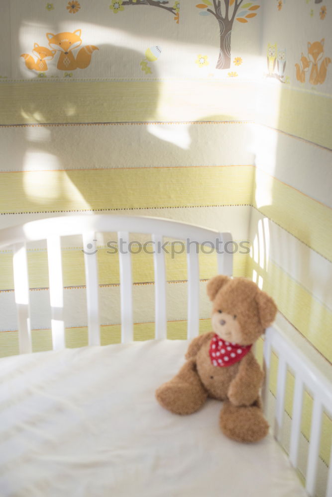 Teddy bear in a baby room