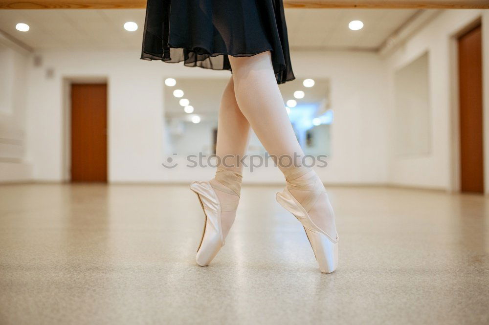 Similar – Image, Stock Photo Close up view to ballerinas legs in white pointes on wooden floor in point position.