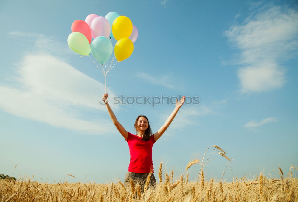 Similar – Image, Stock Photo Woman holding the Gay Rainbow Flag on green meadow outdoor