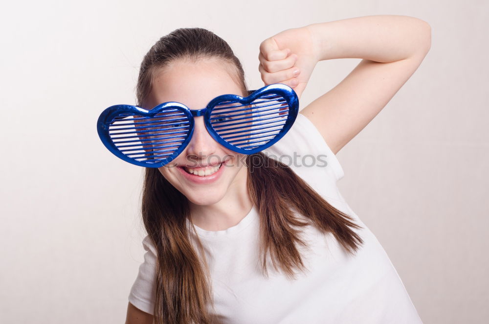 Similar – woman covering her eyes with pieces of sushi