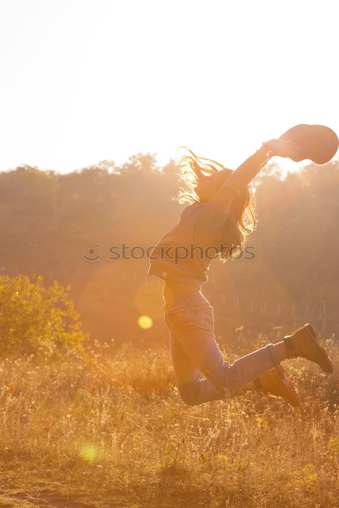 Similar – Image, Stock Photo Man jumping on sunny field