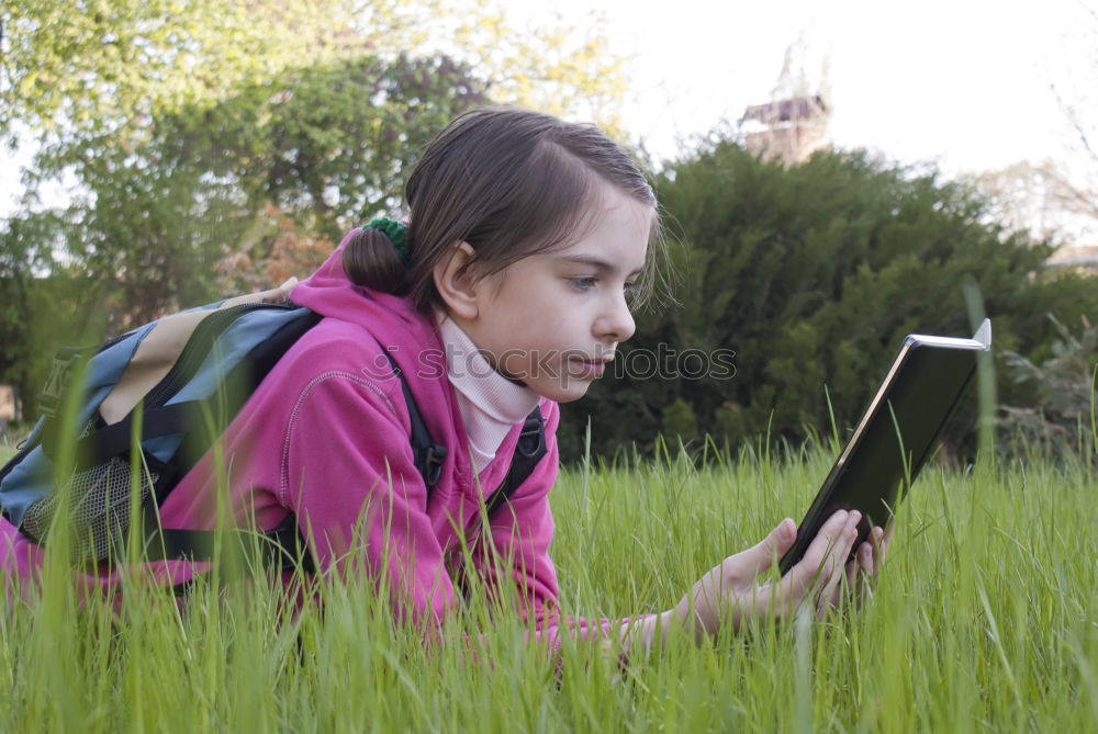 Image, Stock Photo Woman skateboarder listening music from smart phone in a park