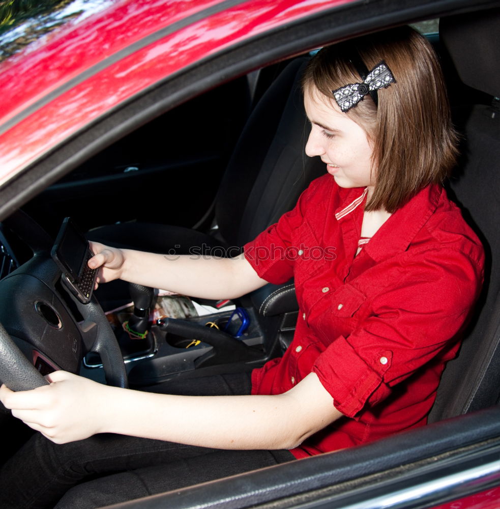 Similar – Image, Stock Photo funny child girl playing driver, sitting on front seat in car