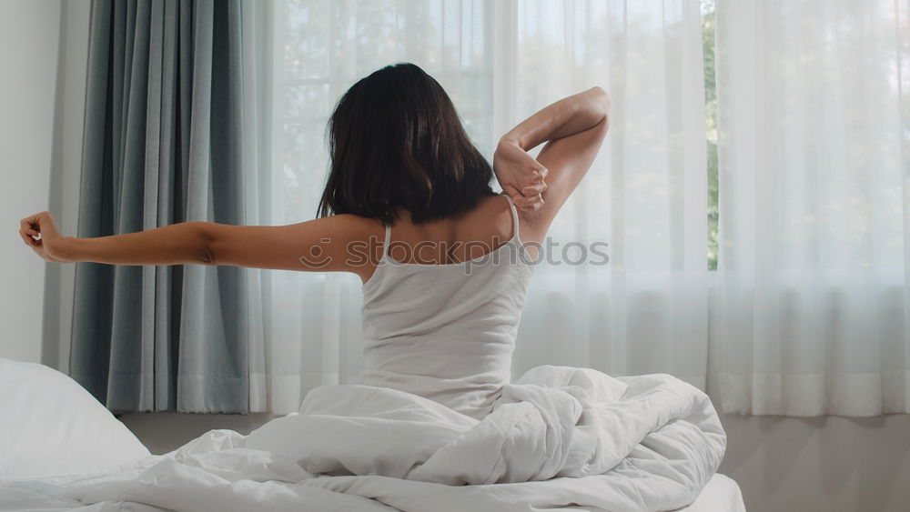 Similar – Image, Stock Photo Woman lying with legs up